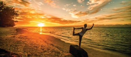 a sunset over a body of water